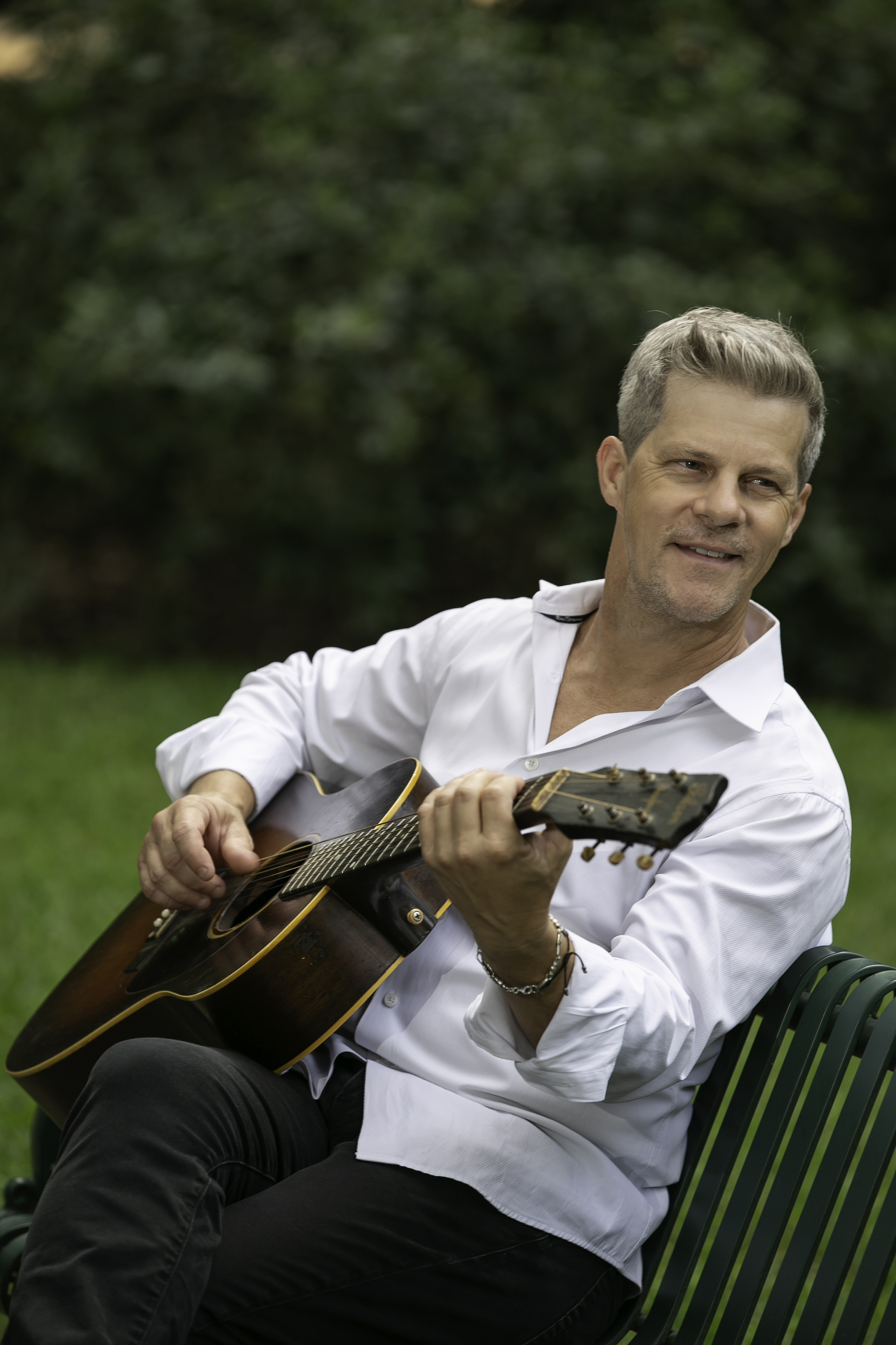 David St Romain with guitar